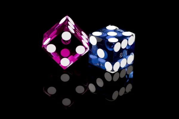 Live Lucky Twins dealer studio showing card table with betting interface and side bet options